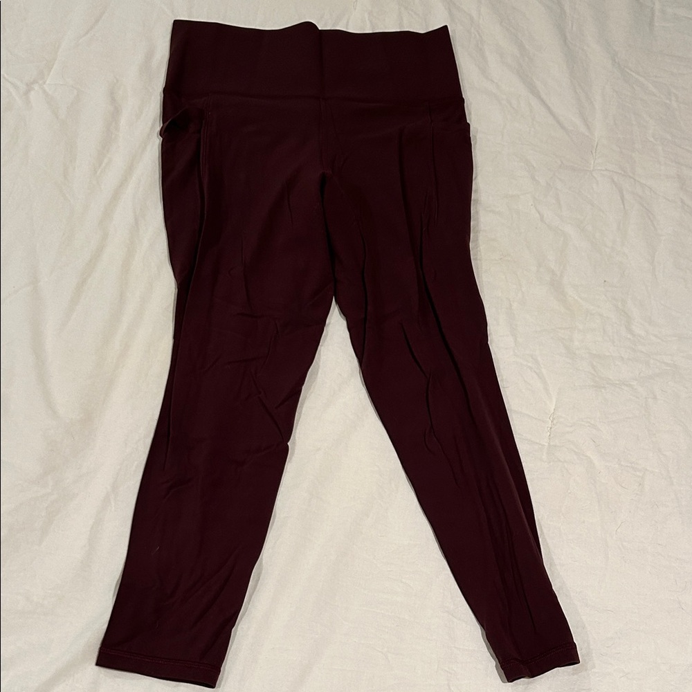 Athleta Salutation Stash Pocket II 7/8 Tight in Burgundy